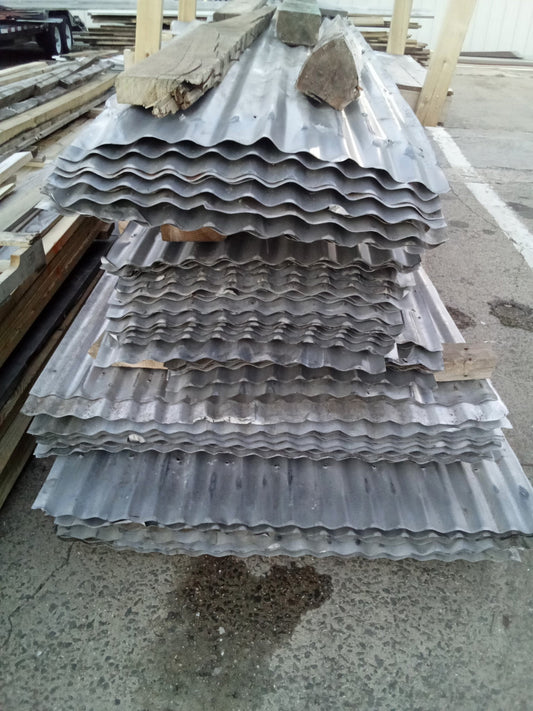 Reclaimed corrugated aluminum roofing sheets from barn salvage