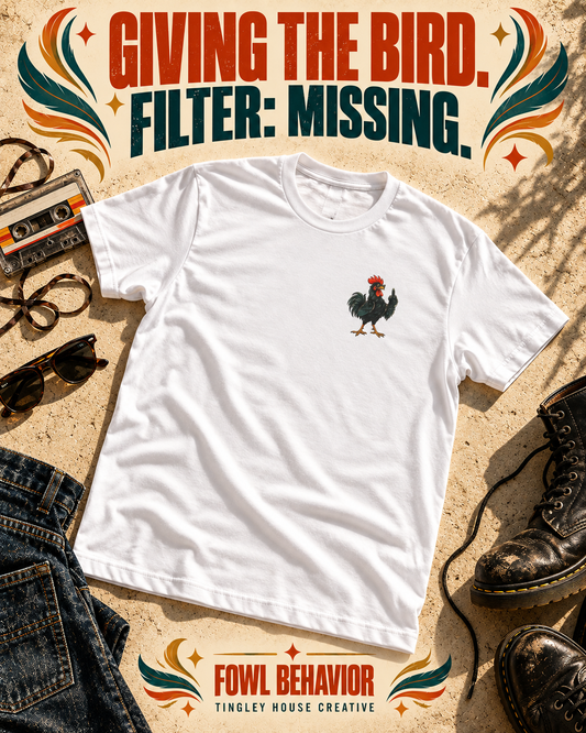 Giving the Bird rooster T-shirt with small left-chest artwork, styled in a bold vintage flat lay.